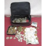 Collection of mixed British and international coins and notes in a maroon case inc. a 1910 half-