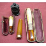 Cased early C20th Meerschaum cheroot holder, amber mouthpiece and silver mount, Edwardian amber