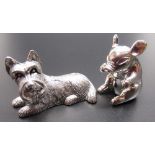 Cast silver figure of a terrier, stamped Sterling 925, and a cast silver figure of a pig, stamped