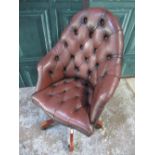 Arched back swivel office chair, brass nail and button upholstered in brown leather, H111cm