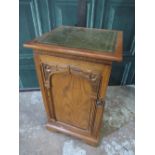 Carved oak office side cabinet containing a metal two-draw filing cabinet, W50cm D50cm H82cm