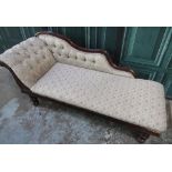 Victorian chaise longue carved frame with buttoned back and scroll end, on turned supports, W175cm