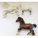 Two Beswick models of cantering Shires, in grey and brown colourways, model no. 975 (3)