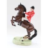 Beswick model of Huntsman on rearing horse, second version, in brown colourway, model no. 868