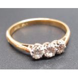 18ct yellow gold and diamond ring, the three brilliant cut diamonds set in platinum mount, stamped