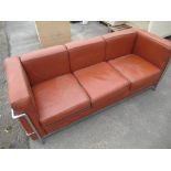 Mid -Century chrome framed brown leather sofa with loose back and seat cushions, W175cm D72cm H70cm