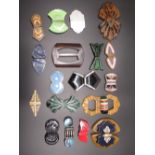 Collection of early C20th and later belt buckles including a large wooden buckle, a yellow
