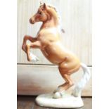Beswick model of rearing Welsh Cob, in Palomino colourway, model no. 1014