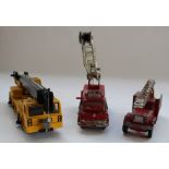 Collection of various diecast maintenance trucks by various manufacturers including Corgi
