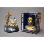 Star Wars C-P3O savings bank, and a C-P3O/R2D2 money bank (C-P3O has a broken ankle. A/F).