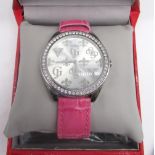 Withdrawn - Guess ladies's wristwatch, chrome dial with diamanté bezel on pink leather strap,