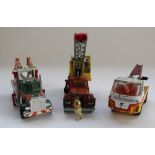 Collection of playworn Corgi and Lesney diecast tow trucks and other construction vehicles,