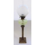 Early C20th brass corinthian column oil lamp with green vaseline glass reservoir, later frosted