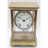Seth Thomas early C20th American four glass brass cased mantel clock, full length bevel edged