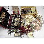 Large collection of costume jewellery including brooches, watches, rings, earrings, necklaces,