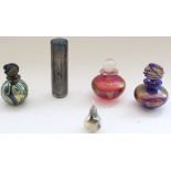 Three Isle of Wight iridescent glass small bottles with stoppers, an IOW vase and small pear