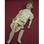 Welsch early C20th bisque head doll with painted papier mache limbs, impressed makers mark, made