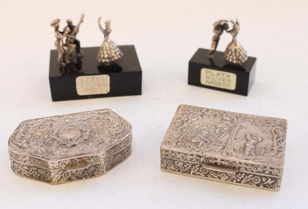 Two continental silver pill boxes, both marked for 0.800 standard and a pair of Spanish silver