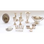 Selection of hallmarked silver to include pedestal bowl, trumpet shape vases, weighted candlesticks,