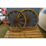 2 metal rimmed wooden wagon wheels with metal hub, approx W78cm