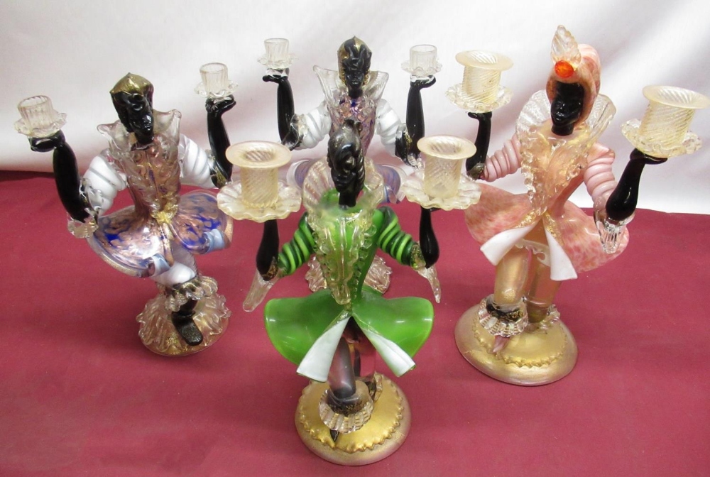 Four Murano style blackamoor twin candle sticks in form of Venetian nobles