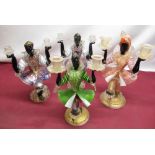 Four Murano style blackamoor twin candle sticks in form of Venetian nobles
