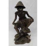 Well carved Indonesian wooden figure of cocoa harvester sat on tree stump (knife blade missing) H20"