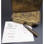 Two WWI Queen Mary Christmas 1914 tobacco tins with embossed lids, one containing 1915 greetings