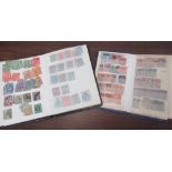 Two pocket albums contianing a large quantity of Victorian to George VI stamps, 1 album all