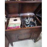 Geisha wind up oak cased cabinet Gramophone, with tambour speaker door, W82cm D49cm H86cm