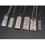 Six hallmarked Sterling silver ingot pendants, five on chains stamped 925, gross 3.58ozt