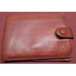 Vintage Rolex red leather folding wallet with embossed gilt makers mark in coin pouch, ref. 60.02.