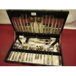C20th canteen of Stainless Steel cutlery for six covers with rose decorated handles, with Kings