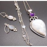 Hallmarked Sterling silver necklace set with oval cut moonstone, stamped 925, with matching drop