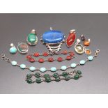 Collection of nine Sterling silver pendants set with various stones including lapis lazul and