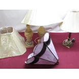 Tiffany style pink and burgundy marbleised lamp shade, two alabaster table lamps with shades,