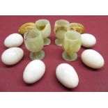 Late C20th set of four carved onyx goblets H7.4cm, eight carved hard stone eggs