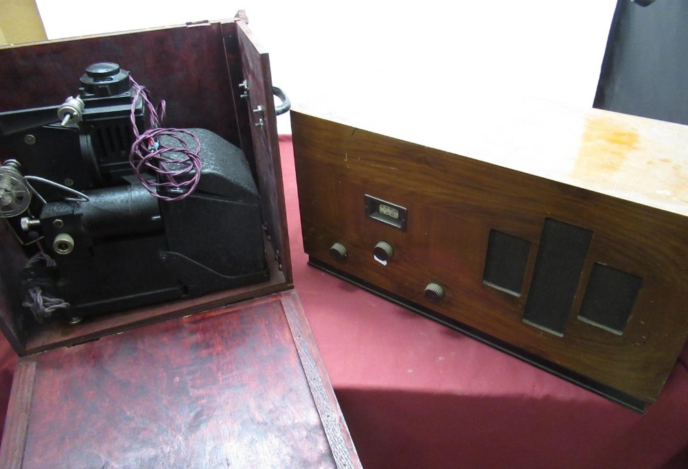 1930's Defiant Radio Receiver model B4434 in walnut veneered case on shaped ebonised plinth W61