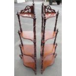 Pair of Victorian mahogany corner what-nots, four shaped graduated tiers on baluster supports,