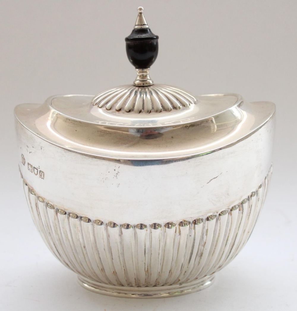 Geo.V hallmarked silver sucriere, reeded body with hinged lid and ebony finial. London 1911, William