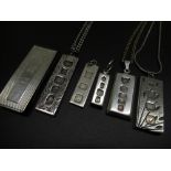 Five hallmarked Sterling silver ingot pendants, three on silver chains, stamped 925, and a