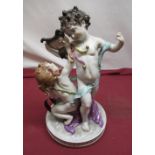 Capo-di Monte style Volkstedt porcelain model of two cherubs emblematic of the Arts, on circular