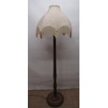 Geo.lll Corinthian style column standard lamp with circular base and a silk fringe shade, H180cm