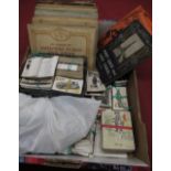 Twelve cigarette card albums, loose cigarette cards of players, other post war collectors cards, "