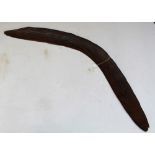 Wooden Australian boomerang with gouged design on both sides