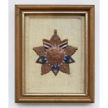 Early C20th Chinese Republic period bronze and enamel order medal, star form with embossed Longma