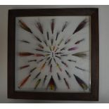 Framed Salmon and Trout lures in a symmetrical pattern. Frame glass and wood. W35.5cm D3.4cm H35.5cm