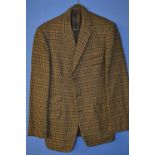 Nicely tailored tweed jacket, no makers marks. No size, would estimate small.