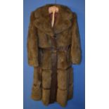 Leather and fur ladies coat by Spinney, size 16.