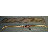 A Royal Scots "The Prince Charles Custom" rosewood archery bow, marked No1285. Height 154cm with a